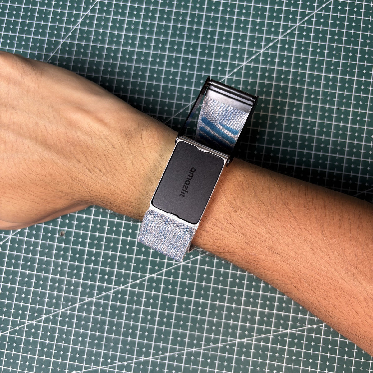 Helio Strap in a Whoop 4.0 band, open to show the V3 Metal Edition adapter