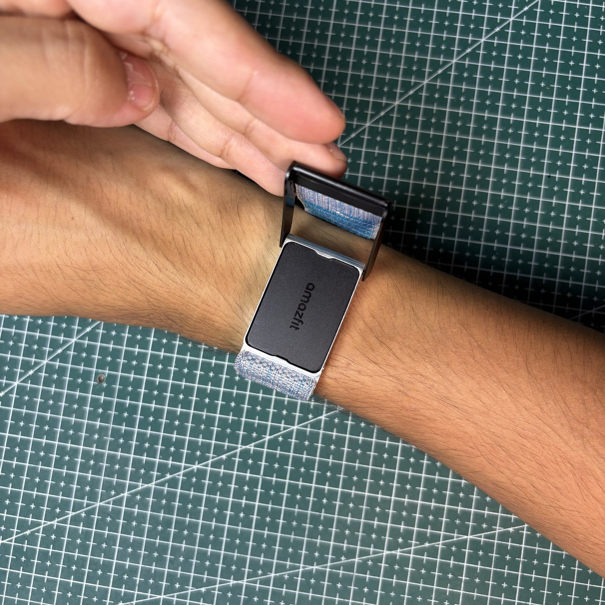 Opening the Whoop 4.0 band clasp with the V3 Metal Edition adapter inside